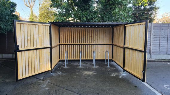 8 Space timber clad cycle shelter front open 01.jpg