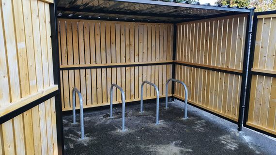 8 Space timber clad cycle shelter front open.jpg