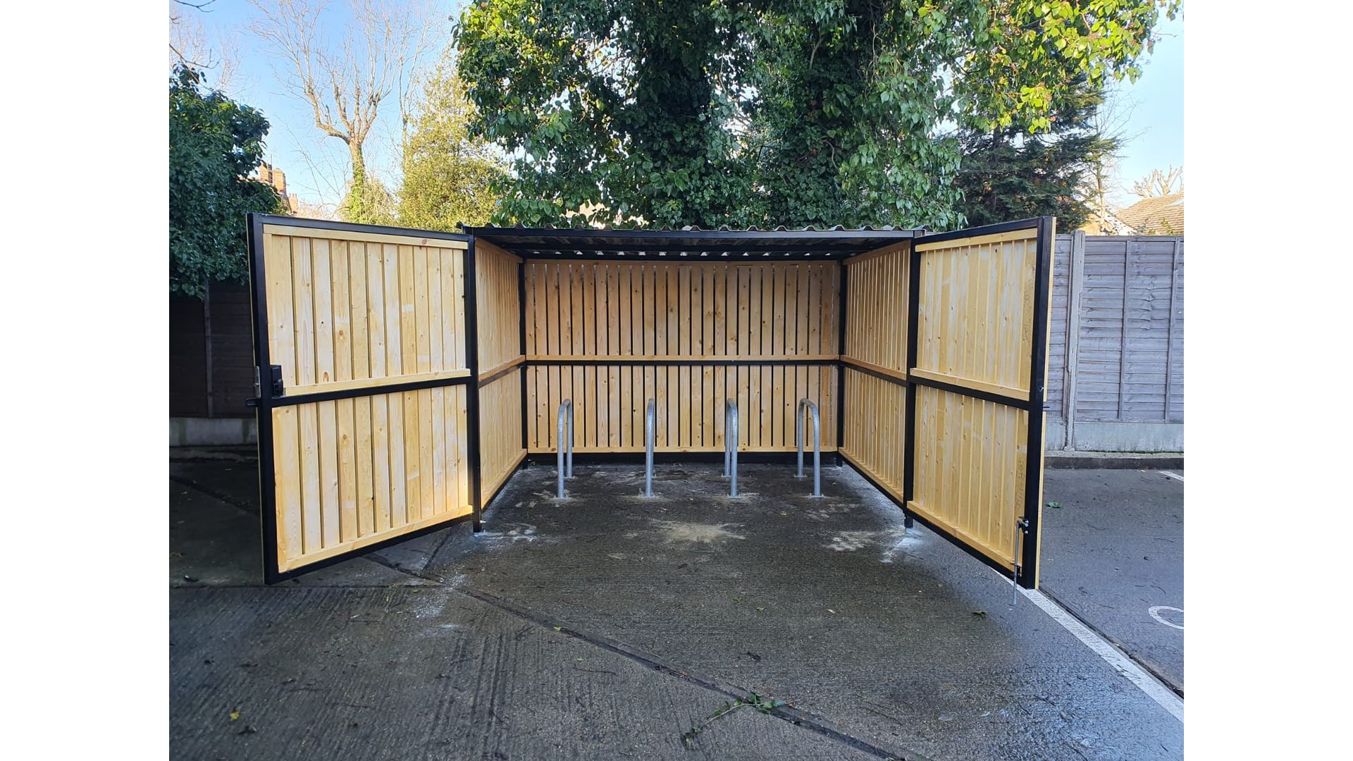 8 Space timber clad cycle shelter front open 01.jpg