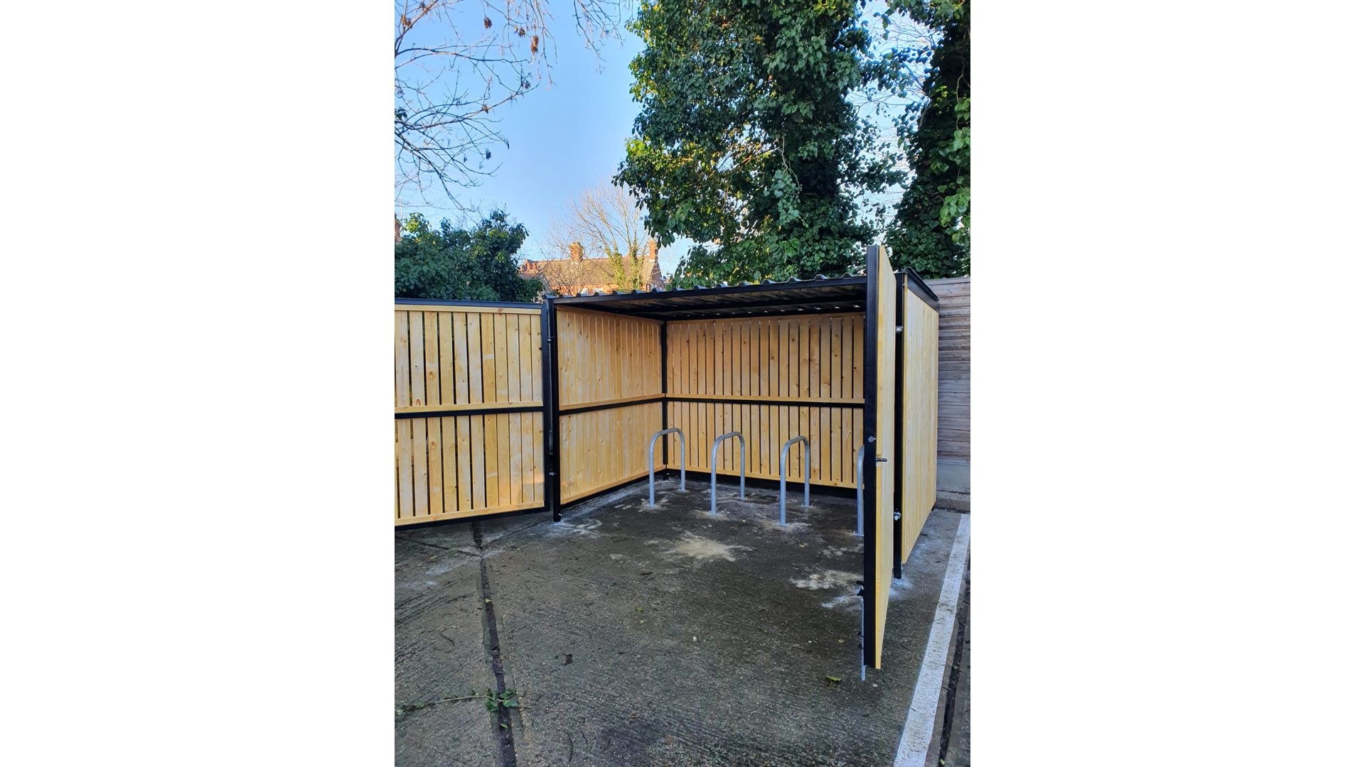 8 Space timber clad cycle shelter gates open.jpg