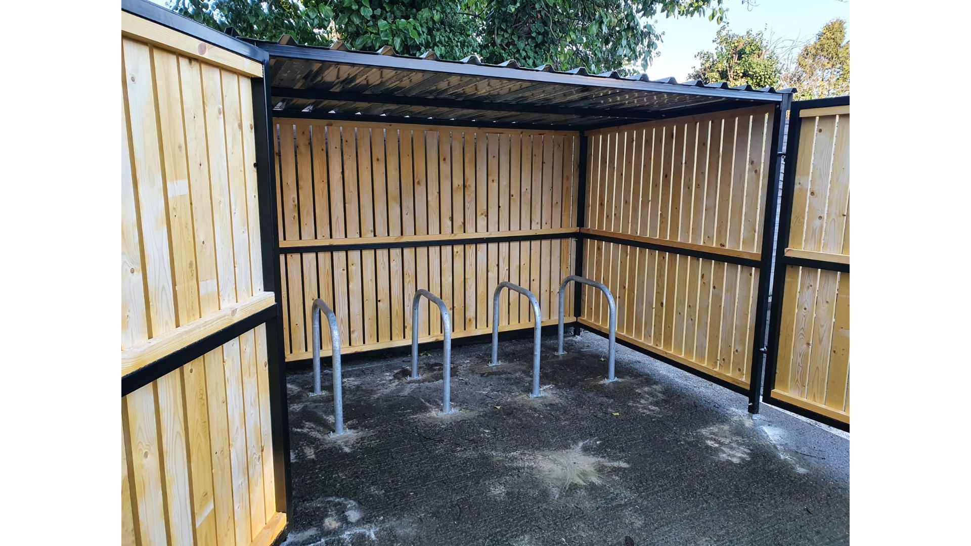 8 Space timber clad cycle shelter front open.jpg
