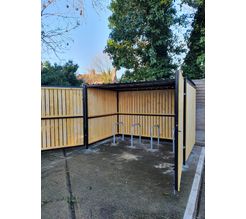 8 Space timber clad cycle shelter gates open.jpg
