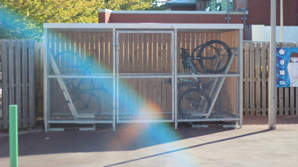 Secure Cycle Store's Timber Clad Bike Shelter, with mesh front and gates. Supplied with galvanised Semi-Vertical Bike racks. Newly installed for the fabulous staff of the NHS Aintree Hospital.