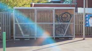 Secure Cycle Store's Timber Clad Bike Shelter, with mesh front and gates. Supplied with galvanised Semi-Vertical Bike racks. Newly installed for the fabulous staff of the NHS Aintree Hospital.