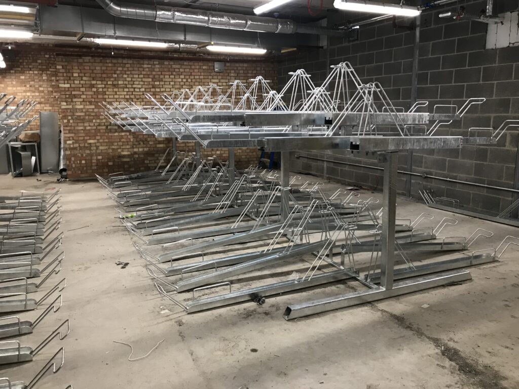 Two-tier bike racks, newly installed in the basement area of Atlas building, London.