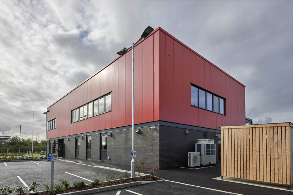 Secure Cycle Store's Trinity Timber Bike Shelter, housing Sheffield bike Stands with a mesh front and gate. All secured with a Digital combination lock for the amazing staff of Violet Way, St. Helens FIRE STATION.