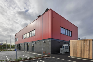 Secure Cycle Store's Trinity Timber Bike Shelter, housing Sheffield bike Stands with a mesh front and gate. All secured with a Digital combination lock for the amazing staff of Violet Way, St. Helens FIRE STATION.