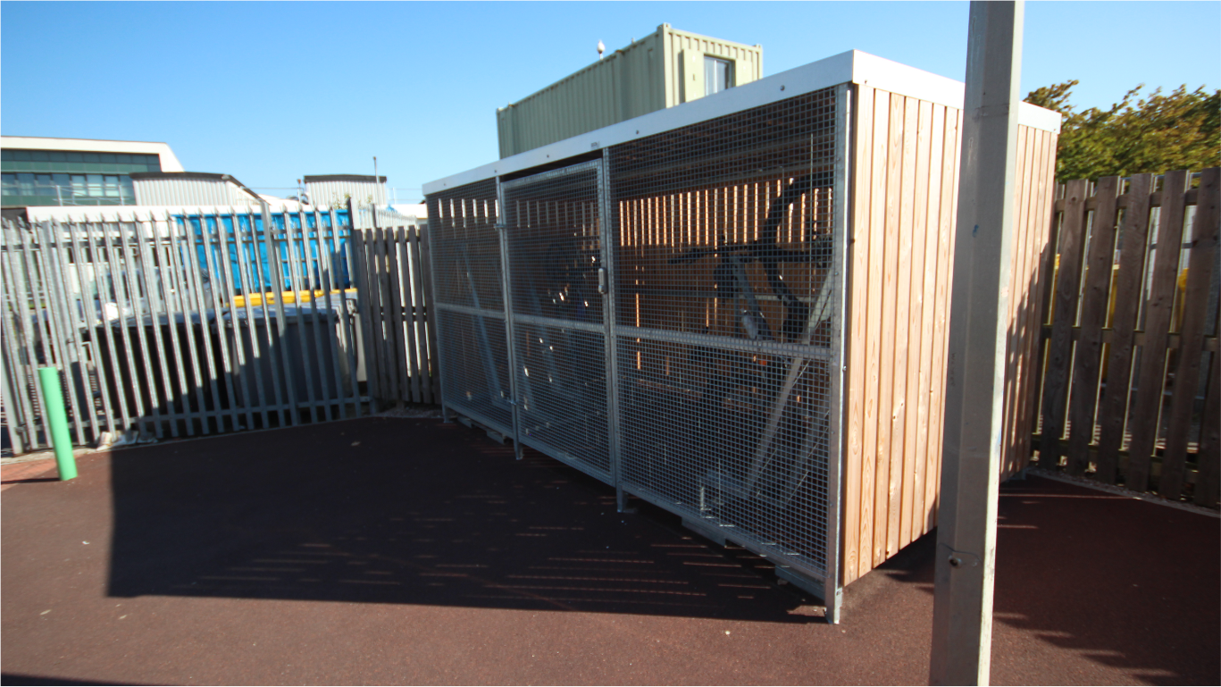 Secure Cycle Store's Timber Clad Bike Shelter, with mesh front and gates. Supplied with galvanised Semi-Vertical Bike racks. Newly installed for the fabulous staff of the NHS Aintree Hospital.