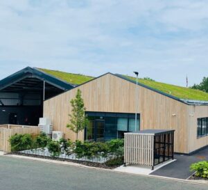 Secure Cycle Store's Trinity Timber Bike Shelter, housing Sheffield bike Stands with a mesh front and gate. All secured with a Digital combination lock for the amazing staff of St. Helens FIRE STATION.
