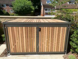 Secure Cycle Store's bespoke low level timber clad bike shelter installed for residential use in Scholar's Green, Cheshire.