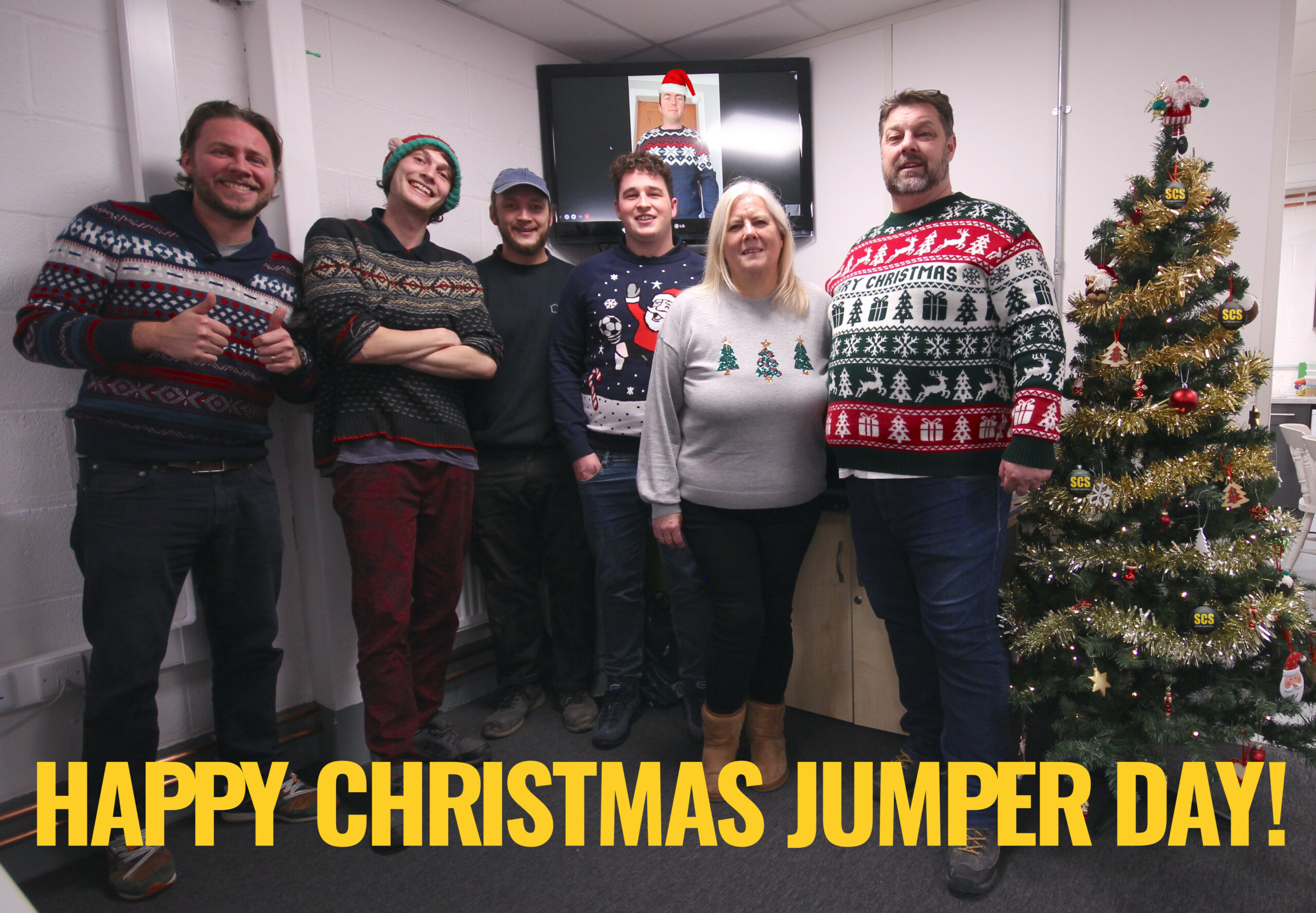 Secure Cycle Store team photo for Christmas jumper day 2022