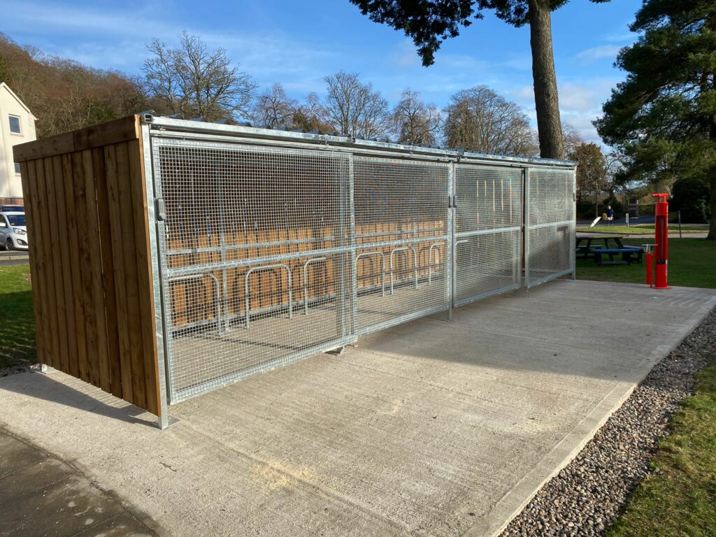 Secure Cycle Store's Trinity timber bike shelter, installed outdoors for the public and staff of NHS Royal Victoria hospital.