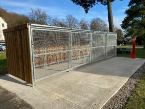 Secure Cycle Store's Trinity timber bike shelter, installed outdoors.