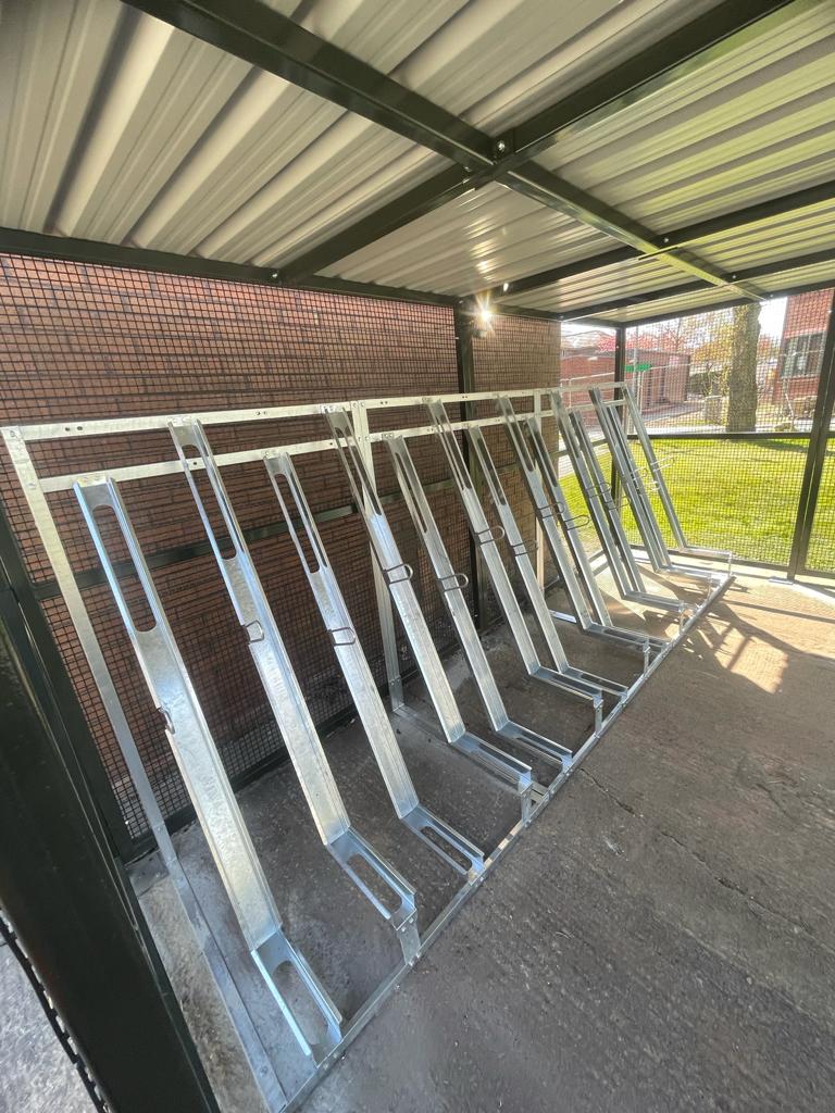 Liverpool University Hospital Bike Hub, bespoke merton mesh bike shelter with semi-vertical bike racks and vast amounts of security features. designed, supplied and installed by Secure Cycle Store.