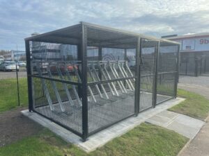 Secure Cycle Store's bespoke merton mesh bike shelter, installed outdoors with RAL 9005 Black finish. Located in South Gyle Crescent, Edinburgh.