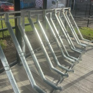 Secure Cycle Store's bespoke Merton Mesh Bike Shelter, with semi-vertical bike racks inside. Located in South Gyle Crescent, Edinburgh.