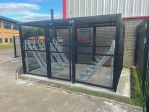 Secure Cycle Store's bespoke merton mesh bike shelter, installed outdoors with RAL 9005 Black finish. Located in South Gyle Crescent, Edinburgh.