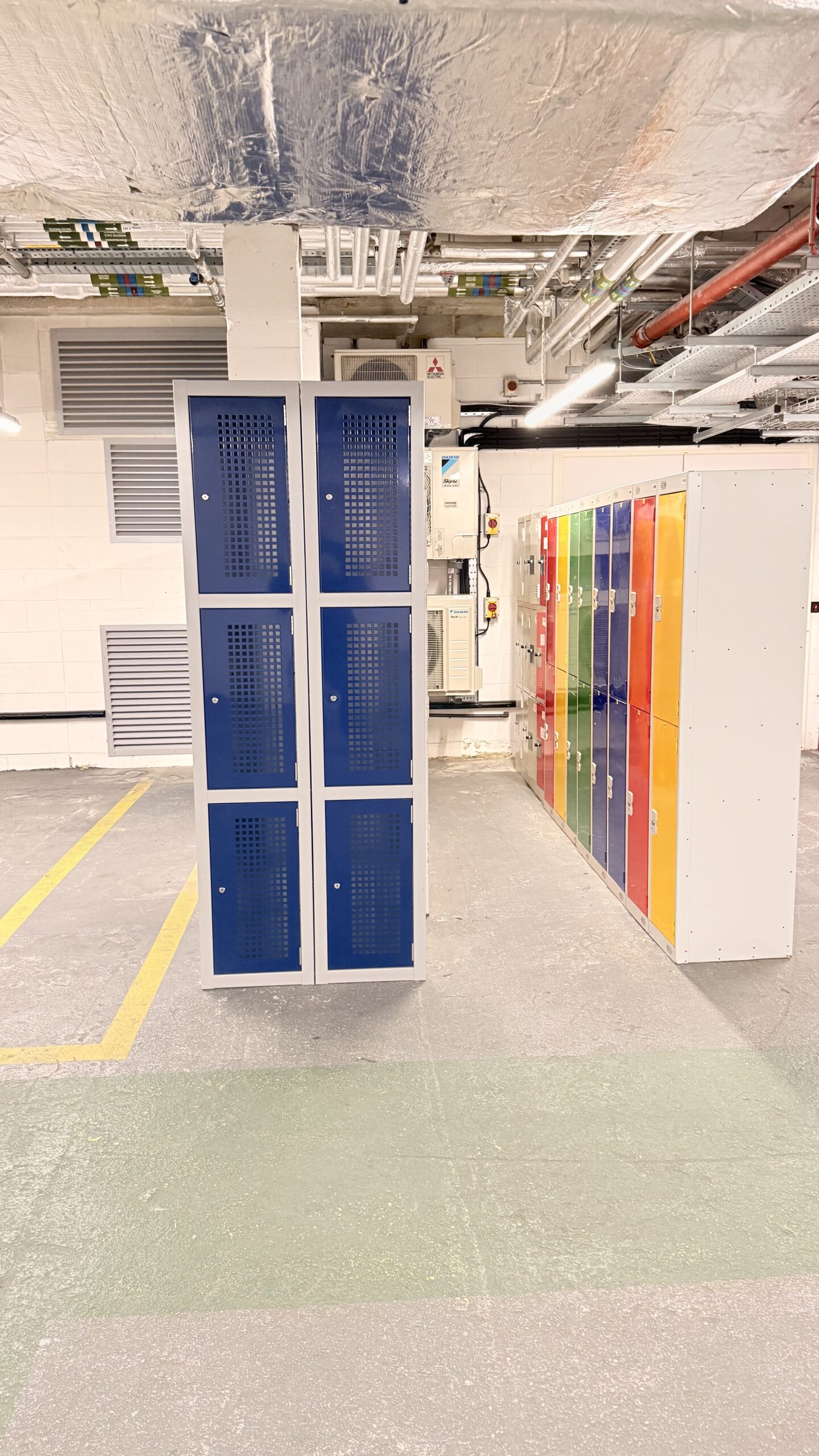 bike lockers installed as a safety measurement for personal belongings and added security for riders and users of a bike storage solution.