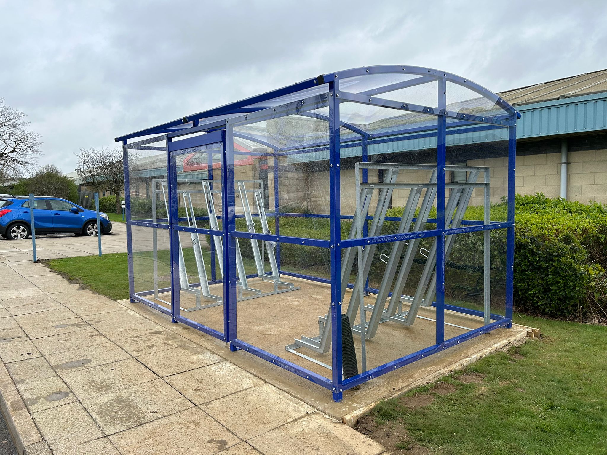 installation of a 12-space Greasby Cycle Shelter,