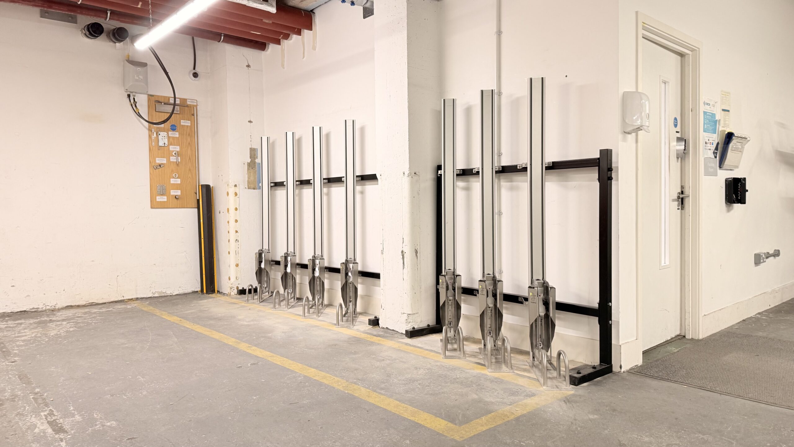 Brushed Steel Basic Automatic Vertical Bike Rack 