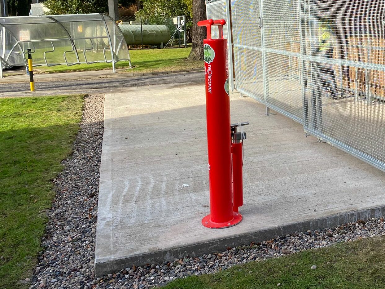 public bike repair stand for added efficiency for the storage solution. Helping users fix their bike if needed.
