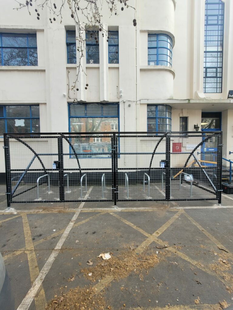 Secure 16-space cycle shelter with mesh gates and secure locking