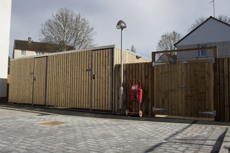 As part of the external works, we were appointed to design, supply and install a Bespoke Combined Trinity Timber Cycle Shelter and Water Tank Store,