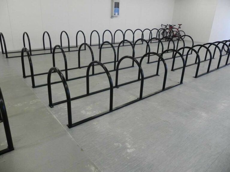 PAR-treated hit and miss timber cladding, with integrated cycle hoops as part of the shelter, securing the bikes. The final finish had achieved all expectations.