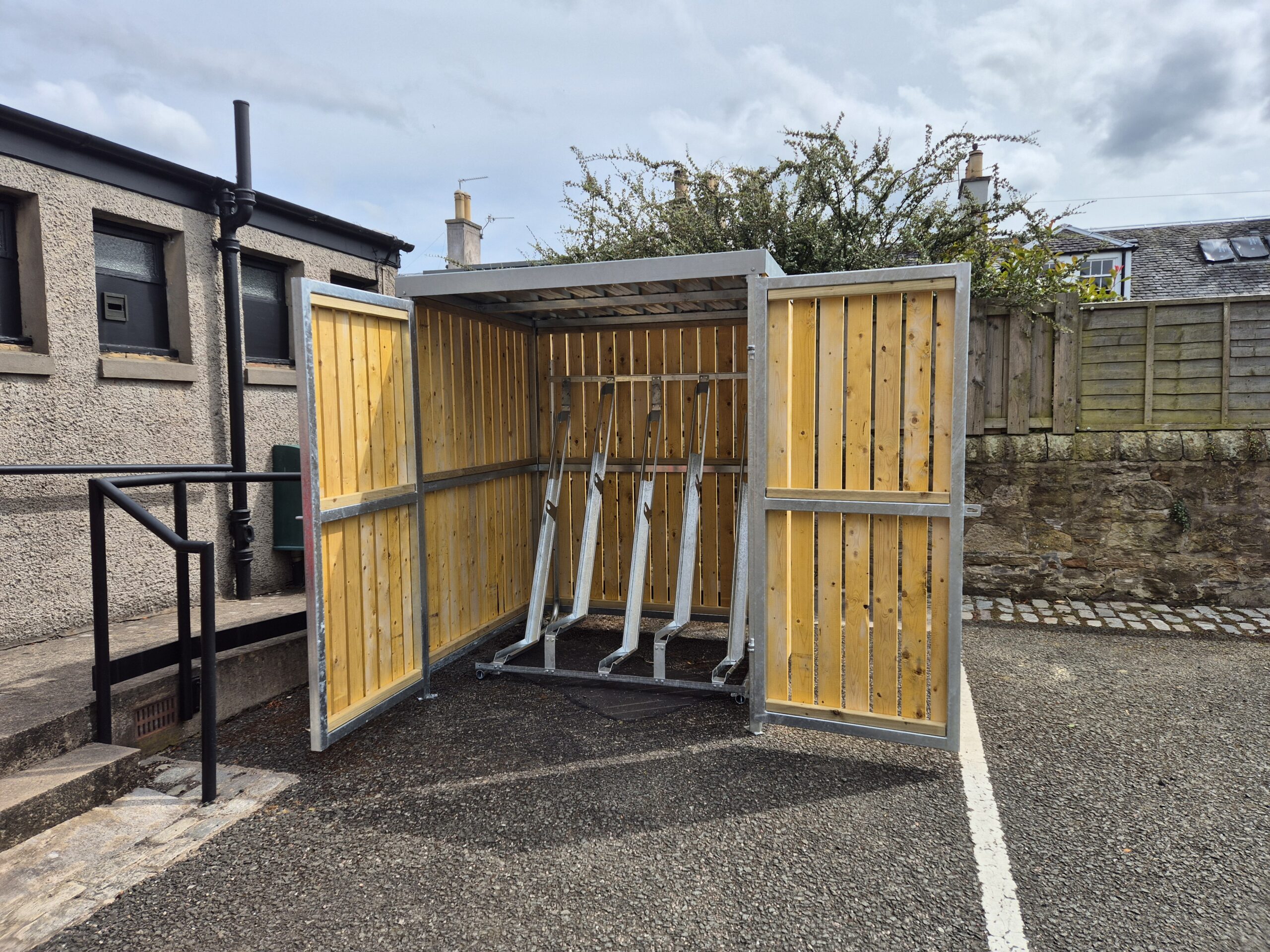 galvanised steel frame, secure lockable gates and cycle racks. 