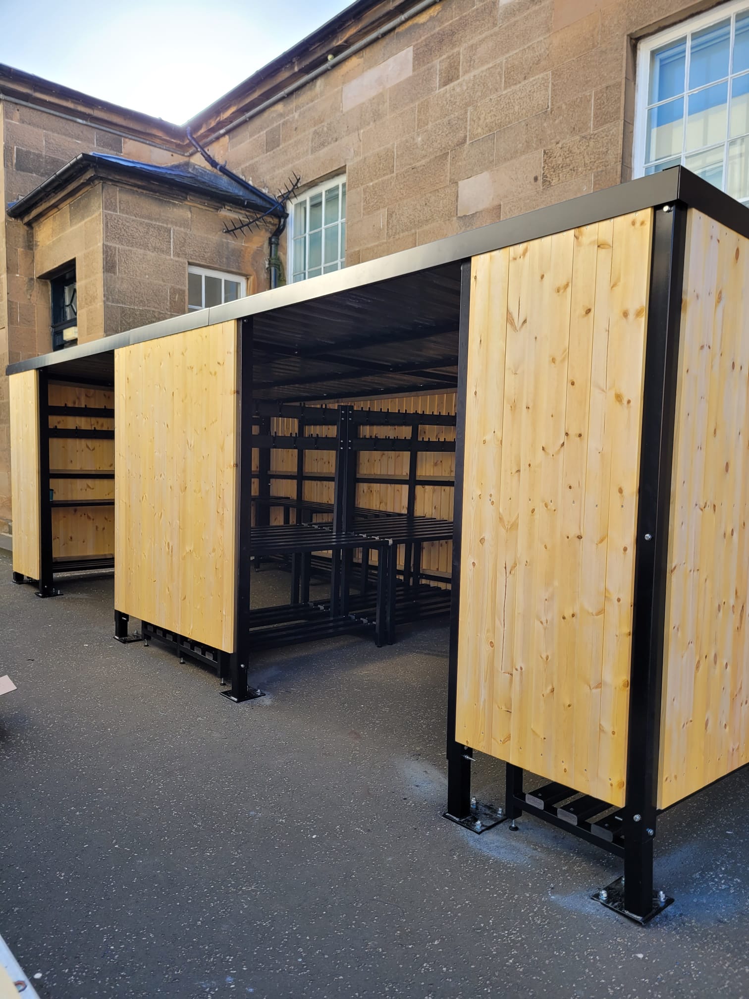 Bespoke timber clad shelters with galvanised steel frames, durable timber cladding and custom layouts for various sectors.