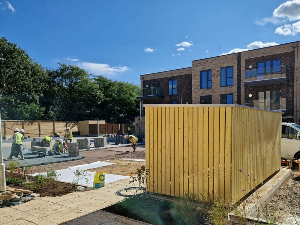 Timber-clad cycle shelters and bin stores supplied and installed at Maple Road,