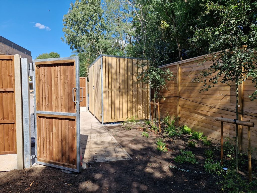Timber-clad cycle shelters and bin stores supplied and installed at Maple Road,