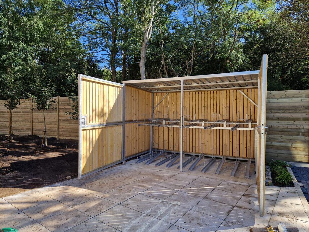 Timber-clad cycle shelters and bin stores supplied and installed at Maple Road,